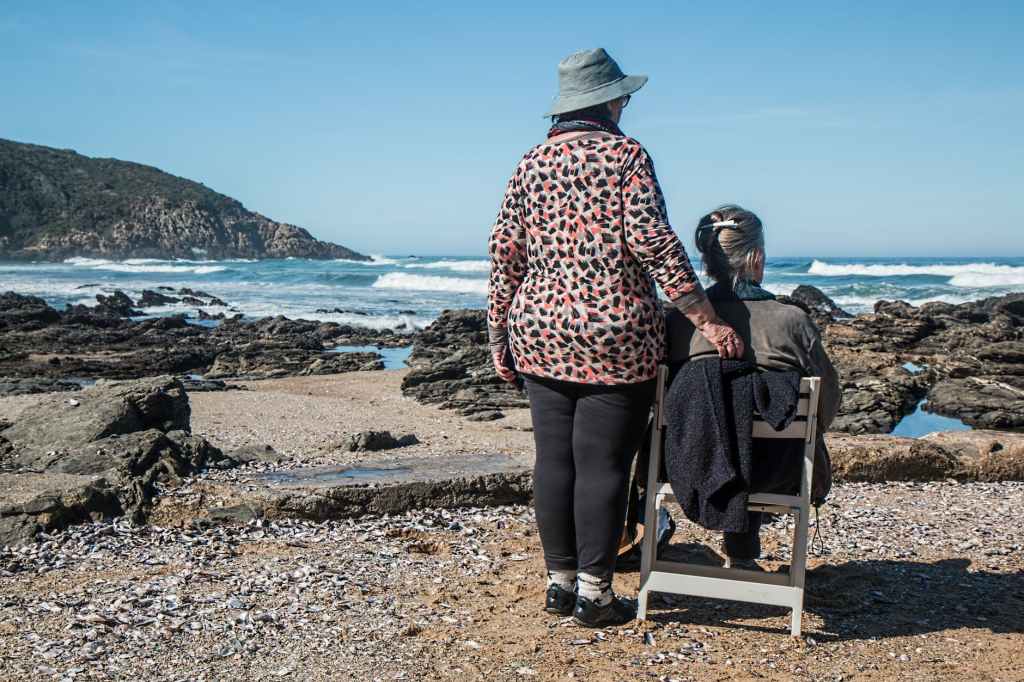 An old couple sat at the coast. 6 evidence-bevidence-based ways to help to prevent Alzheimer's.