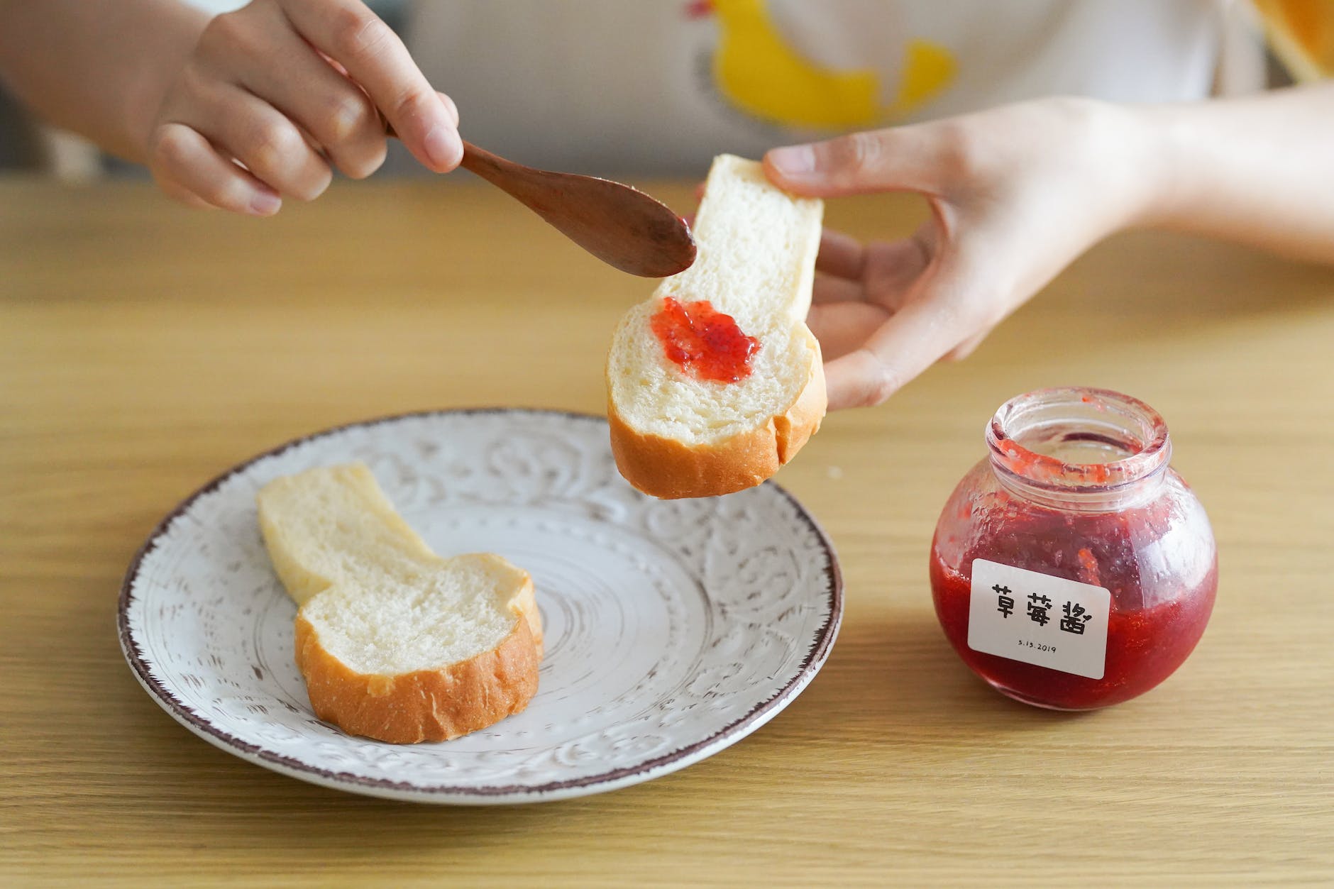 person holding bread